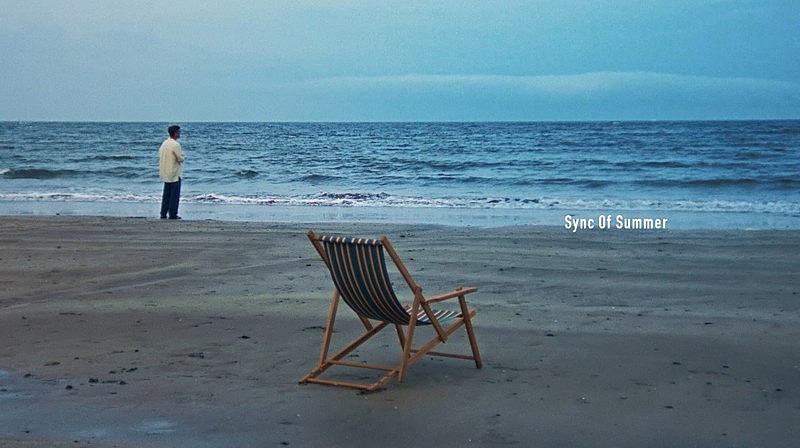 山下達郎、夏のポップソング「Sync Of Summer」MVで描く“海辺で思い返す、あの夏” 