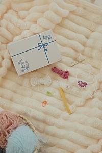 SAKURA（LE SSERAFIM）による編み物プロジェクト「KKUROCHET Holiday