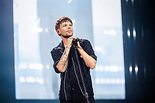 「ルイ・トムリンソン、ワン・ダイレクション結成16周年に思い出の楽曲を振り返る「自分のボーカルを初めて誇りに思えた」」